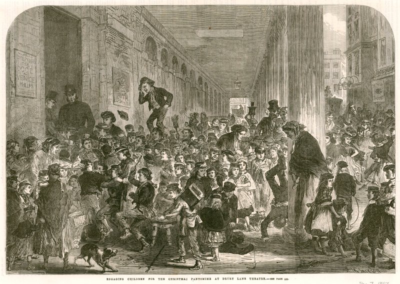 Envolvendo as crianças para a pantomima de Natal no Drury Lane Theatre, em Londres de English School