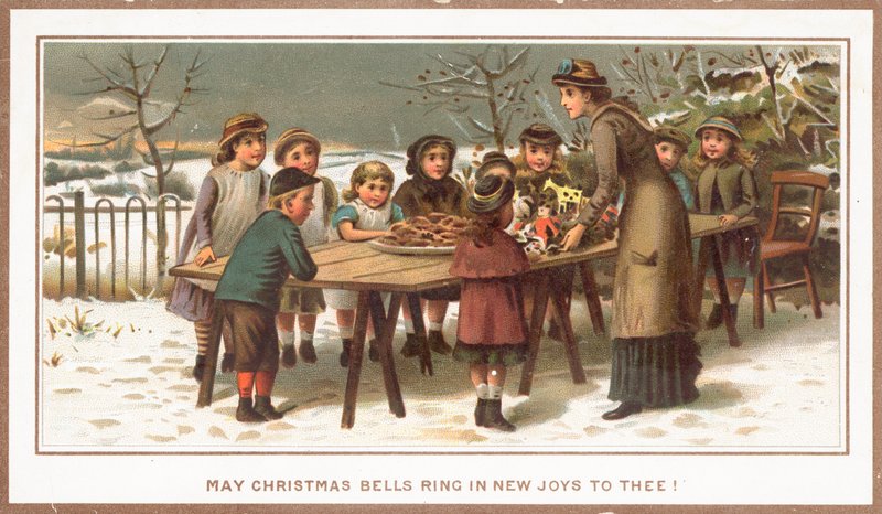 Comida e brinquedos em uma mesa de tressle para crianças, cartão de Natal de English School