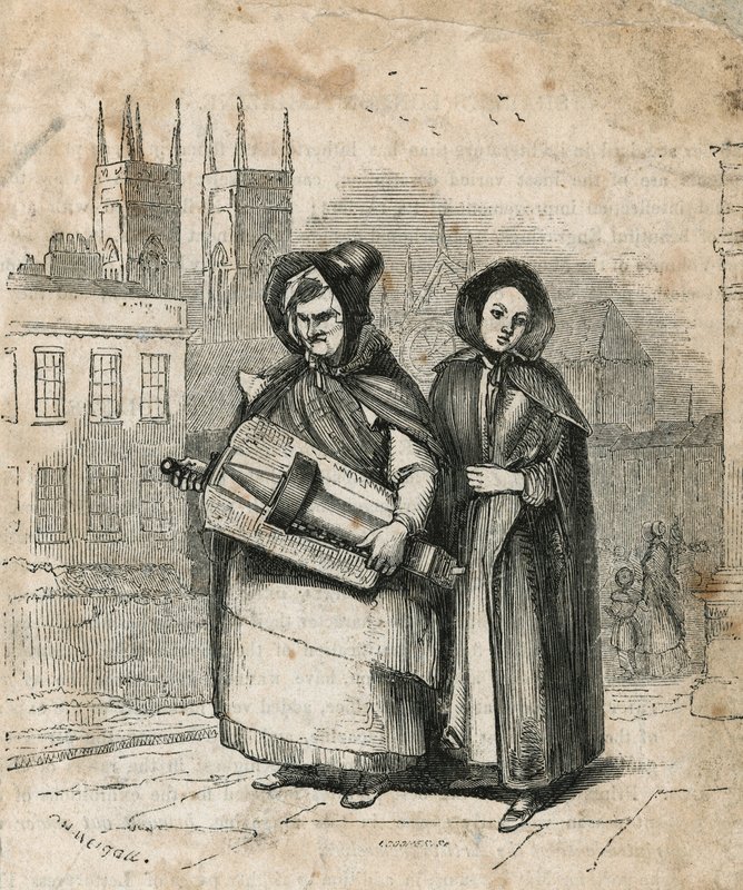 Hurdy gurdy sendo carregado por mãe e filha de English School