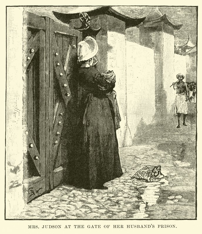Sra. Judson no portão de sua prisão de maridos de English School