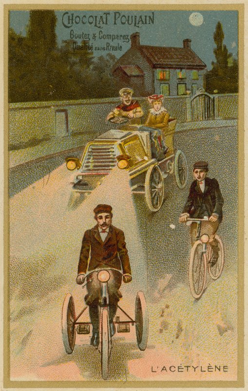 Faróis de acetileno em um carro de motor e uma motocicleta de French School