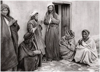Um mulá ensinando uma oração a um jovem, Iraque, 1925.