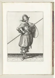 O exercício de escudo e espiga: o soldado move o espigão para a posição de arrasto em duas vezes, primeiro movimento (nº 13), 1618 O Nassausche Wapen-Handelinge, van Schilt, Spies, Rappier and the Targe : beyde figuerlick retratado, final emoldurado após o