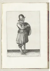 O exercício com escudo e lança: o soldado puxa o braço do cinto do escudo (n.º 25), 1618
De Nassausche Wapen-Handelinge, van Schilt, Spies, Rappier ende Targe : beyde figuerlick afgebebeelt, ende gestelt na de nieuwe ordening [van] (...) Maurits