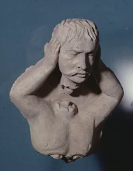 Demônio destacando sua cabeça, estilo greco-budista, de Hadda, do primeiro ao quarto século