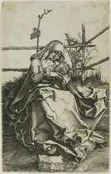 Madonna em um banco gramado