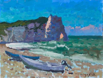 Penhascos à beira-mar e barcos