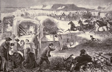 Um comboio de vagões formado num Corral na trilha do Oregon