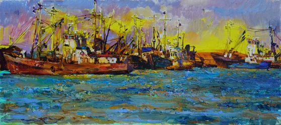 Barcos de pesca ao pôr-do-sol