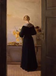 Rapariga a arranjar flores
