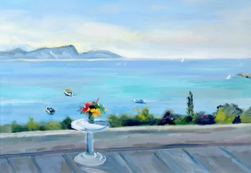 Um terraço com vista para o mar