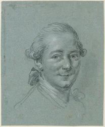 Retrato de um homem sorridente, com a cabeça meio virada para a direita, olhando para o observador