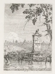 Vistas: O pequeno monumento debaixo de uma árvore