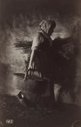 Camponesa carregando uma cesta e feno, c. 1870.