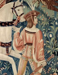 Idade Média: a partida a cavalo para a caça com falcão. Pormenor de uma tapeçaria de seda e lã do início do século XVI. Proveniente de Hainaut. Paris, Museu Nacional da Idade Média, Termas de Cluny