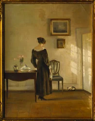 Um interior com uma mulher alimentando um gato (óleo sobre tela)