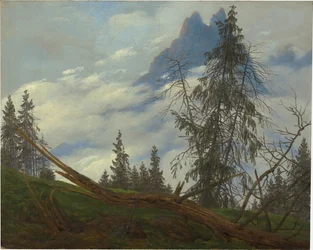 Cume de montanha com nuvens à deriva