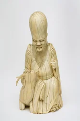 Figura esculpida em marfim de Shou Xing sentado com veados, c.1580-1644