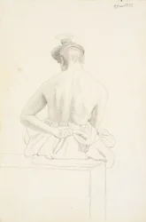 Modelo feminino sentado visto por trás