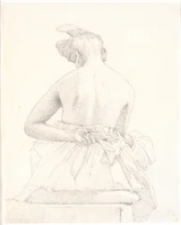 Modelo feminino sentado visto por trás