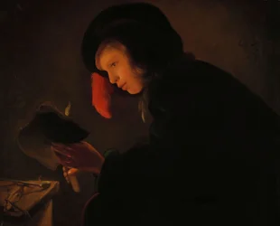 Jovem à luz de velas