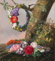 Um ramo de flores ao pé de uma árvore