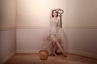 A Mulher Misteriosa e a Chave da Apple