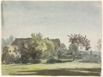 Casa de fazenda atrás das árvores