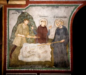 O milagre do Godo: São Bento de Núrsia, acompanhado por São Mauro, seu primeiro discípulo, encontrou um camponês godo e reparou milagrosamente a sua foice. Fresco do Mestre Consolo (século XIII), Igreja Inferior, Mosteiro de São Bento (Sacro Speco)