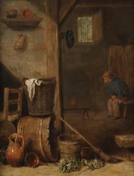 Interior de uma cozinha com uma figura sentada na sala adjacente
