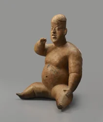 Figura sentada (louça de barro com cunha)