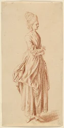 Uma dama de pé em um vestido de dia
