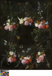 Cartela esculpida adornada com flores