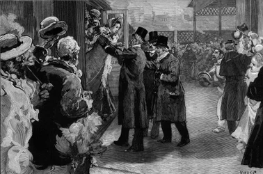 Louise Michel retornou à França (1830-1905) após sua deportação por sua participação na Comuna de Paris. Foi recebido na estação de Saint Lazare (Saint-Lazare) por Henri Rochefort (1831-1913), Louis Blanc (181-1882) e George Clemenceau (1841-1929).