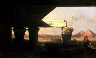 Paisagem egípcia com uma vista distante das pirâmides