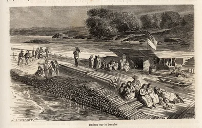 Uma jangada de madeira no Danúbio, para o transporte de mercadorias e pessoas, desenhada por Lancelot, para ilustrar a viagem de Victor Duruy de Paris a Bucareste em 1860. Gravura em "Le tour du monde", editado por Edouard Charton