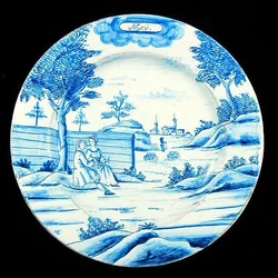 Placa de retentor retratando o mês de Maio (louça de lata)