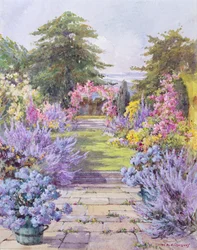 O caminho de laje em um jardim de verão (wc no papel)
