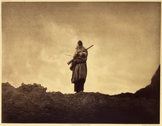 O caçador de ovelhas, Sioux. As ovelhas de montanha, pastando nas partes mais inacessíveis das Terras Más, eram procuradas apenas pelos caçadores mais ousados. Foto tirada do volume 3 da enciclopédia de Edward S. Curtis (1868-1952) sobre os índios norte-am