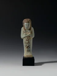 Shabti de Akhesenmut, possivelmente de Deir el-Bahri, New Kingdom (faiança)