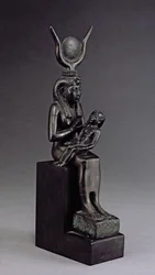 A deusa Ísis a amamentar o bebé Horus, período tardio (bronze)