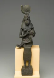 Estatueta sentada de Ísis segurando Horus (bronze)