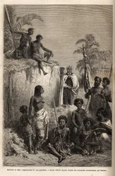 Kamehameha I (ca. 1758-1819), rei das Ilhas Havaianas e fundador da sua unidade, cercou guerreiros havaianos e alguns súditos em Honolulu, gravando após o desenho de Emile Bayard, ilustrando a viagem às Ilhas Sandwich, em 1855-69, por C