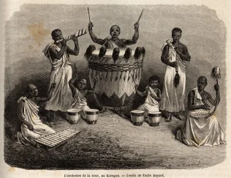 A orquestra da corte, no Karague (a oeste do Lago Vitória, actual Zimbabwe), desenho de Emile Bayard (1837-1891), ilustrando a viagem de descoberta do Capitão Speke em África de 1860 a 1863. Gravura em "Le tour du monde", editado por Edouard Char