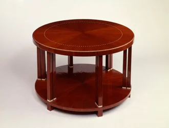 Uma mesa baixa redonda de dois níveis com folheado de jacarandá, incrustada com marfim (jacarandá, marfim)