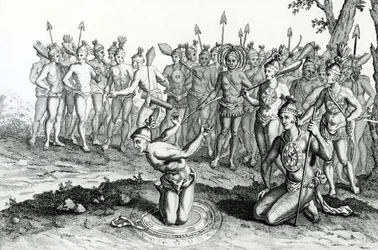 Um rei da Florida consulta o seu mágico antes de ir para a batalha, ilustração extraída de Viagens e jornadas de Moore, 1778