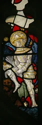 Um detalhe da janela do leste representando um membro da hierarquia anglicana, um poder
