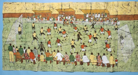 Batik Africano ilustrando um jogo de futebol com multidões assistindo nas arquibancadas (têxtil)