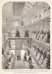 Mulher Condenada no Trabalho durante a Hora do Silêncio na Prisão de Brixton, de The Criminal Prison of London e Scenes of Prison Life por Henry Mayhew (1812-1887) e John Binny, 1860