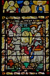 A janela do leste representando a prisão do músico anjo de São João e Virgin & Child e outra Virgem no dossel